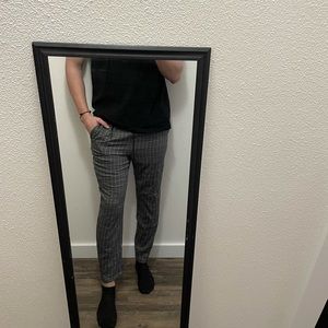 Fashionable pants. Slim fit. Grey with white checkered pattern.